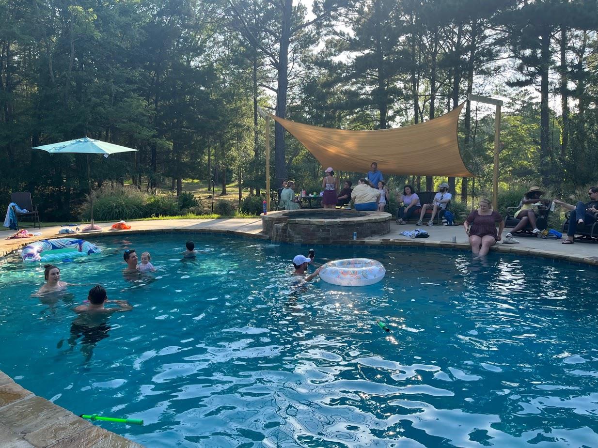 pediatric residents at outdoor pool party